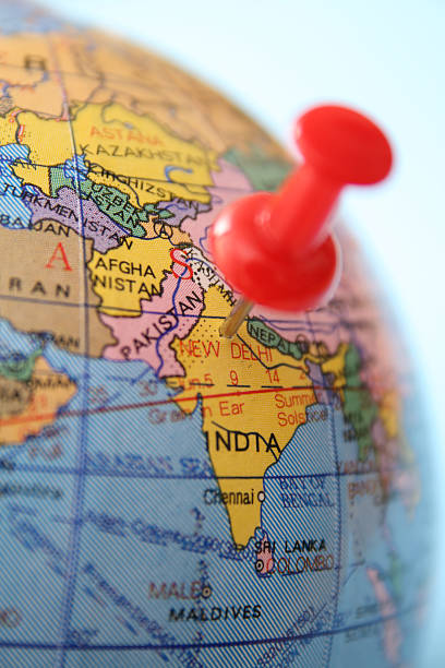 A pin marking India on a globe - GID is starting in India